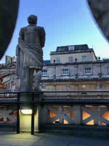 Back view of a statue near Cross Bath