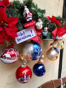 Christmas decoration ball, flowers, and Santa dolls