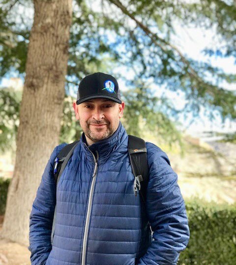 Samuel Garza with tree in background in Albarracin, Spain