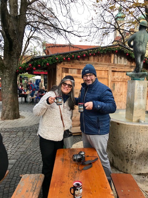 Samuel having a coffee with a lady traveler