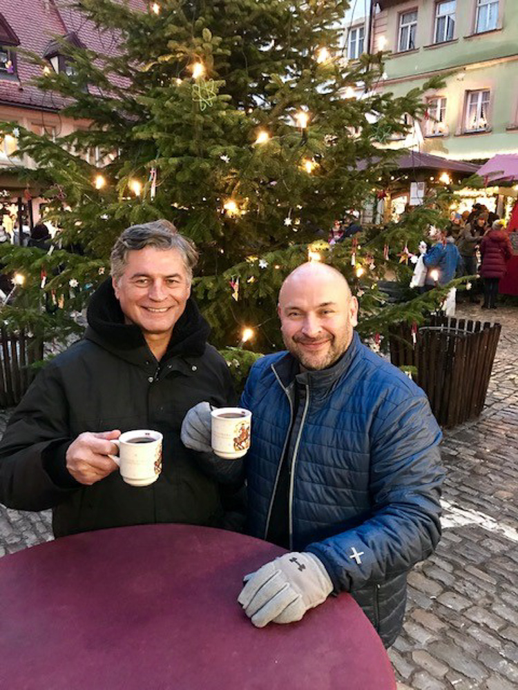 a tourist having coffee with Samuel in Christmas tour