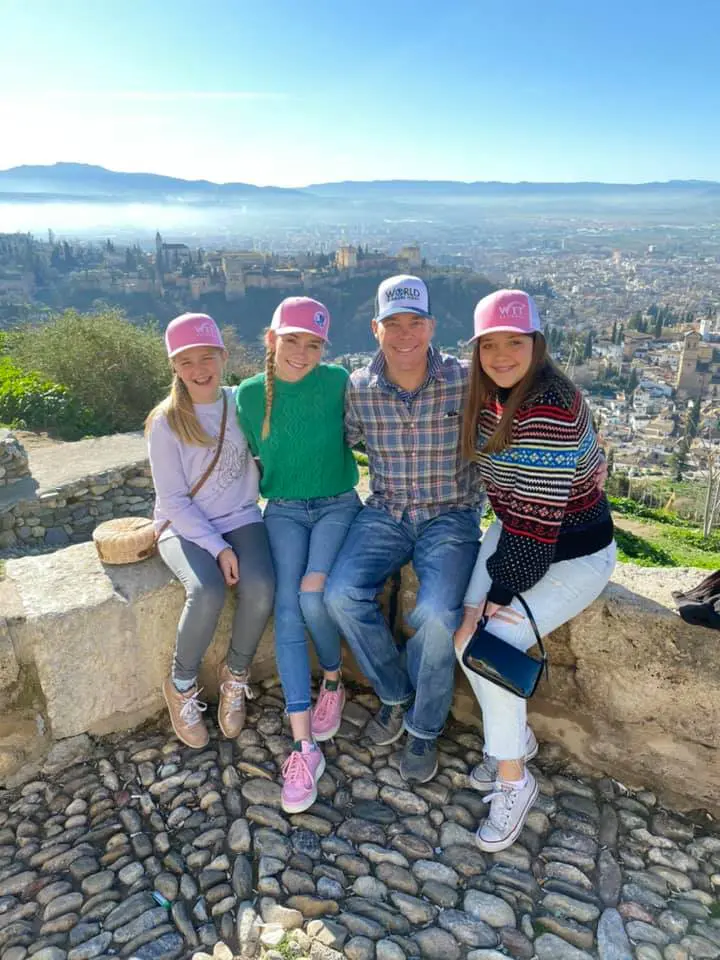 a family of four at a historic place during their tour